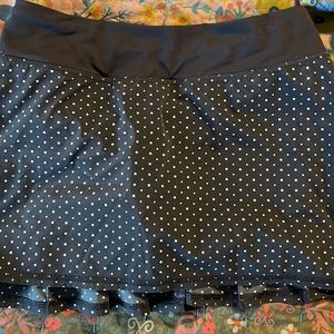 Lulu lemon swim/workout skirt with hidden shorts and small stash pocket.